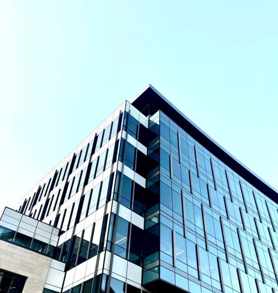 gray concrete building under white sky during daytime